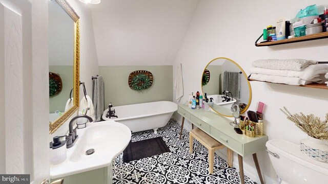 240 Dogwood Dr, Romney, WV 26757 - full bath featuring a freestanding bath, vanity, toilet, lofted ceiling, and tile patterned floors