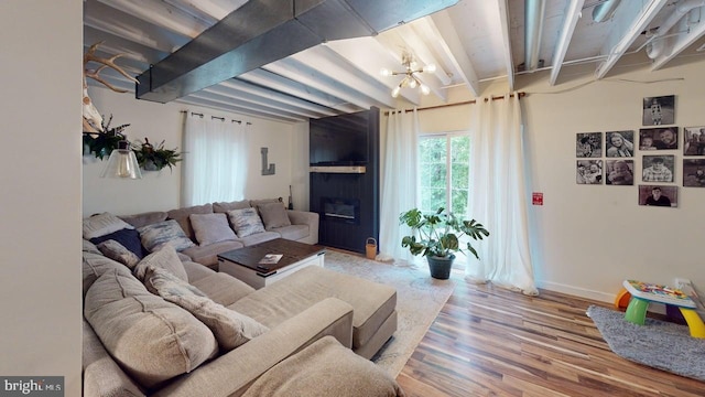 240 Dogwood Dr, Romney, WV 26757 - living room featuring wood finished floors, beam ceiling, baseboards, and a chandelier