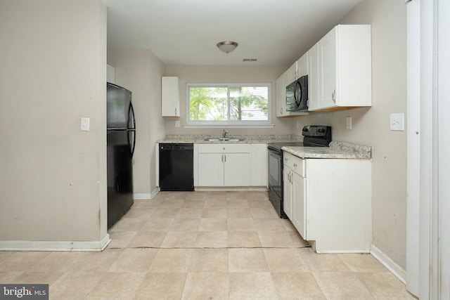 4 Corvas Ct, Sewell, NJ 08080 - kitchen featuring black appliances, a sink, white cabinets, and baseboards
