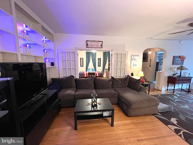 460 Baltimore St, Gettysburg, PA 17325 - living room featuring arched walkways, wood finished floors, and a ceiling fan