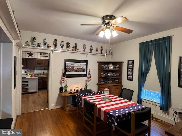 460 Baltimore St, Gettysburg, PA 17325 - dining room featuring wood finished floors, a ceiling fan, and baseboards