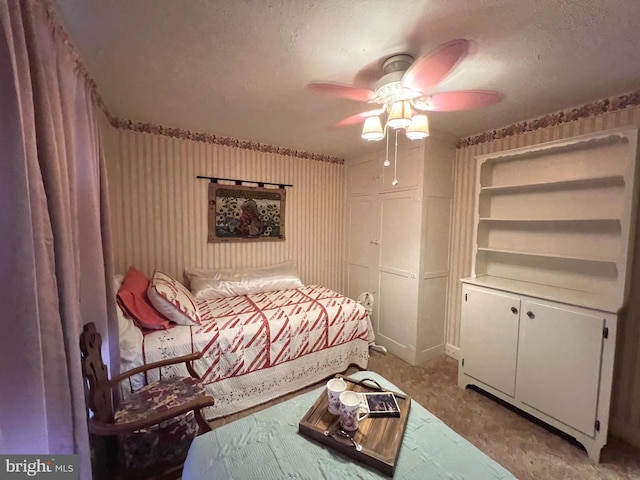 460 Baltimore St, Gettysburg, PA 17325 - bedroom with a textured ceiling, ceiling fan, and light colored carpet