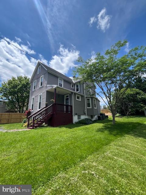 7536 Marks Ave, Nottingham, MD 21236 - rear view of house with central AC unit