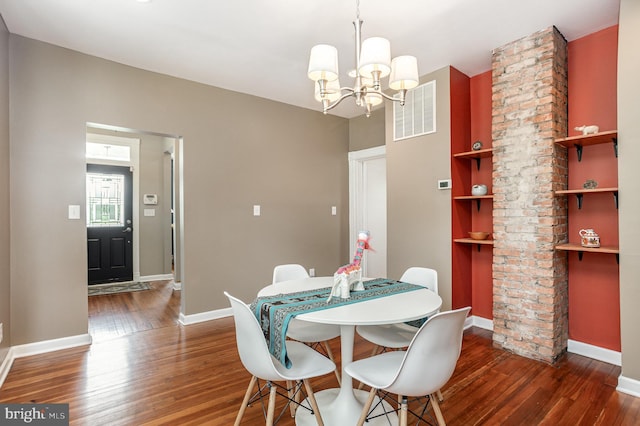 7536 Marks Ave, Nottingham, MD 21236 - dining space featuring hardwood / wood-style flooring, a chandelier, and baseboards