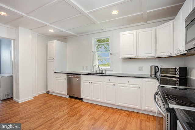 7536 Marks Ave, Nottingham, MD 21236 - kitchen featuring stainless steel appliances, a sink, recessed lighting, light wood-type flooring, and white cabinetry