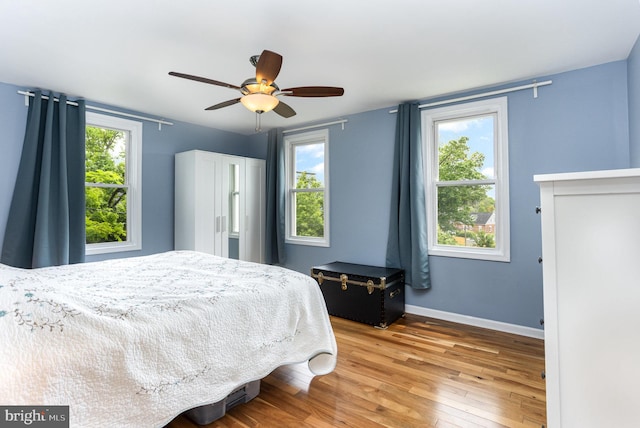 7536 Marks Ave, Nottingham, MD 21236 - bedroom with wood-type flooring, baseboards, and ceiling fan
