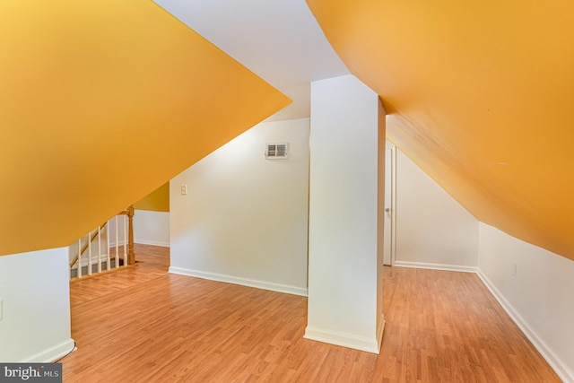 7536 Marks Ave, Nottingham, MD 21236 - bonus room with wood finished floors, baseboards, and vaulted ceiling