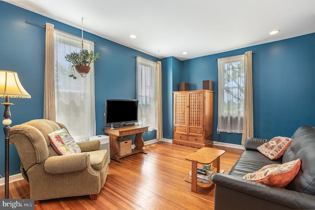 7536 Marks Ave, Nottingham, MD 21236 - living area with healthy amount of natural light, hardwood / wood-style floors, baseboards, and recessed lighting