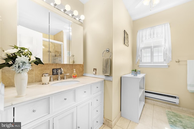 29 Sheffield Pl, Southampton, NJ 08088 - bathroom with a baseboard heating unit, a shower stall, vanity, tile patterned floors, and tasteful backsplash