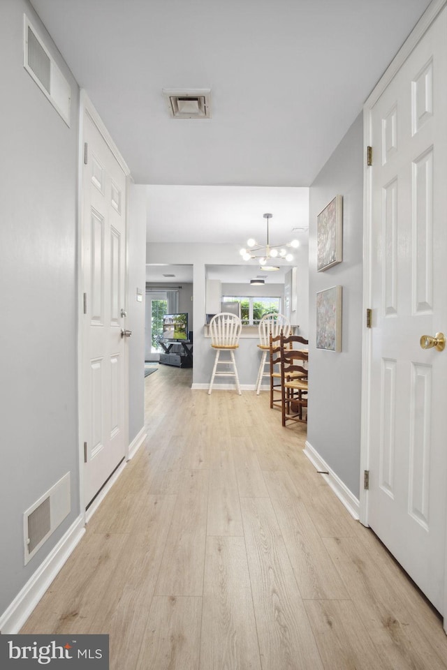 204 Fawn Rdg N, Harrisburg, PA 17110 - hall featuring wood finished floors and baseboards