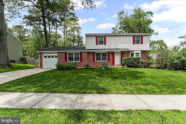 242 Pennwood St, Newark, DE 19713 - traditional-style house with brick siding, an attached garage, and driveway