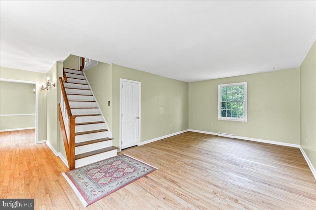 242 Pennwood St, Newark, DE 19713 - staircase featuring wood finished floors and baseboards