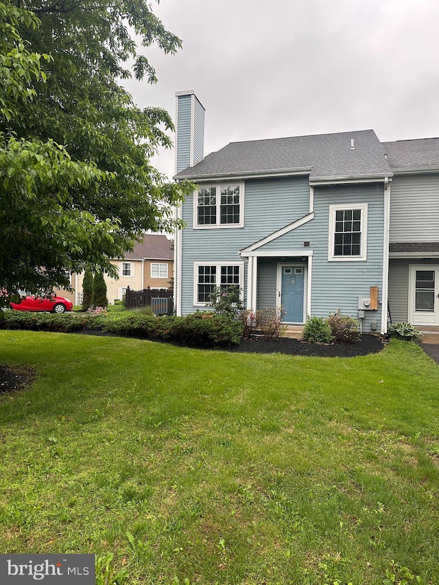 144 Carousel Cir, Doylestown, PA 18901 - view of front of property featuring a chimney and a front yard