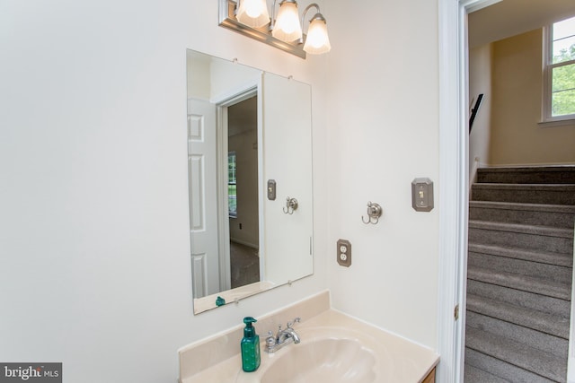 144 Carousel Cir, Doylestown, PA 18901 - bathroom featuring vanity and a chandelier