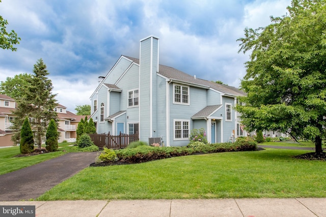 144 Carousel Cir, Doylestown, PA 18901 - view of front of property with a chimney and central air condition unit