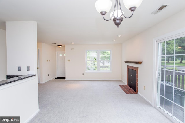 144 Carousel Cir, Doylestown, PA 18901 - unfurnished living room with a chandelier, a tiled fireplace, light carpet, and baseboards