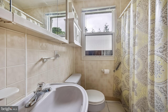 3962 Bensalem Blvd, Bensalem, PA 19020 - full bath with tile walls, toilet, a sink, and a shower with shower curtain
