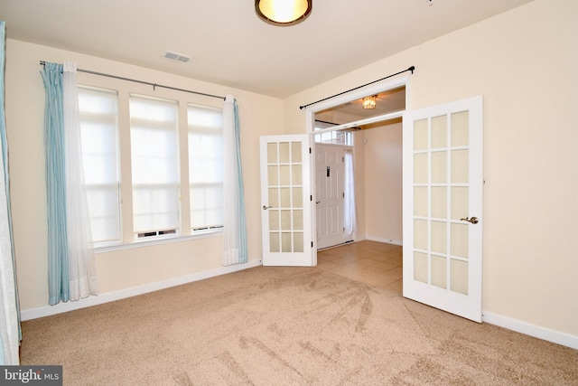 11665 Leesborough Cir, Silver Spring, MD 20902 - carpeted empty room with french doors and baseboards