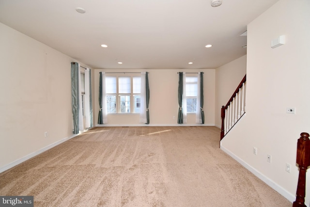 11665 Leesborough Cir, Silver Spring, MD 20902 - unfurnished living room featuring light carpet, recessed lighting, baseboards, and stairway