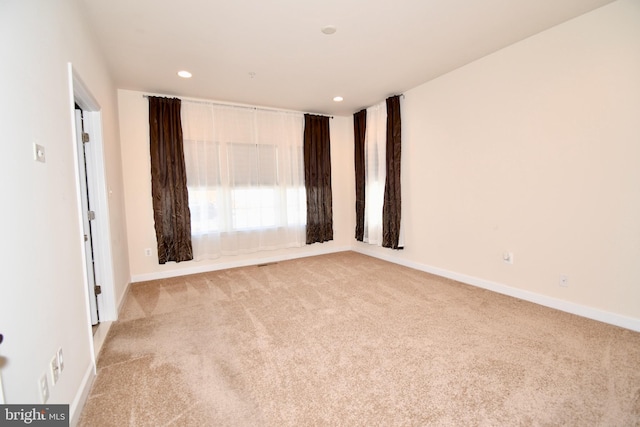 11665 Leesborough Cir, Silver Spring, MD 20902 - unfurnished room featuring light colored carpet, recessed lighting, and baseboards
