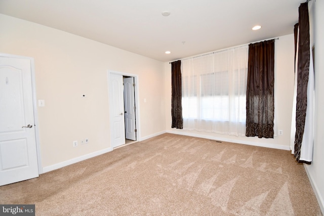 11665 Leesborough Cir, Silver Spring, MD 20902 - unfurnished room with carpet floors, baseboards, and recessed lighting