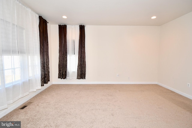11665 Leesborough Cir, Silver Spring, MD 20902 - spare room featuring carpet flooring, baseboards, and recessed lighting