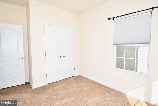 11665 Leesborough Cir, Silver Spring, MD 20902 - unfurnished bedroom with carpet floors, baseboards, and a closet