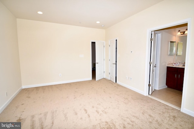 11665 Leesborough Cir, Silver Spring, MD 20902 - unfurnished bedroom featuring carpet flooring, recessed lighting, baseboards, and ensuite bathroom