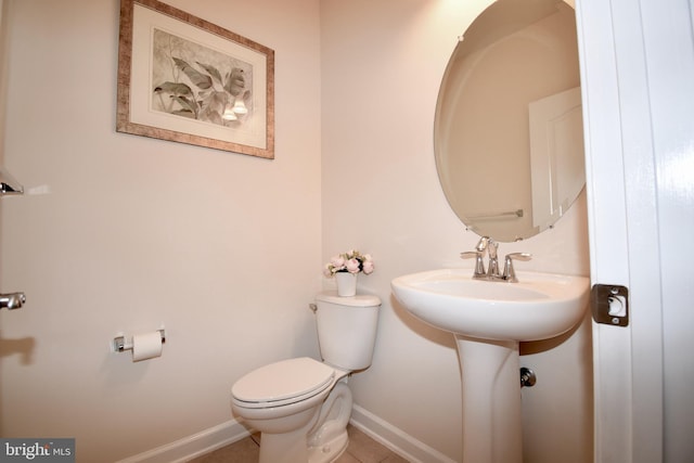 11665 Leesborough Cir, Silver Spring, MD 20902 - bathroom with toilet, baseboards, and tile patterned flooring