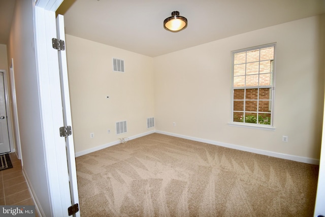 11665 Leesborough Cir, Silver Spring, MD 20902 - unfurnished room featuring carpet floors, baseboards, and plenty of natural light