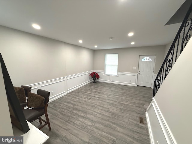 1165 Atwood Rd, Philadelphia, PA 19151 - entryway with recessed lighting, stairway, wainscoting, wood finished floors, and a decorative wall