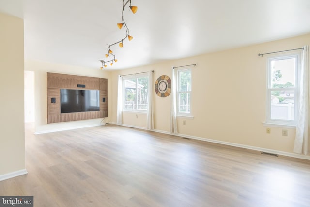 2331 Cambridge Cir, Hatfield, PA 19440 - unfurnished living room with light wood-style floors and baseboards