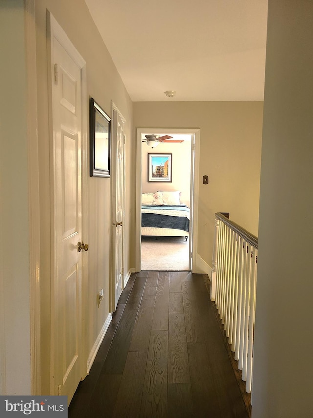 302 Old Lancaster Rd, Devon, PA 19333 - hallway with dark wood finished floors and baseboards