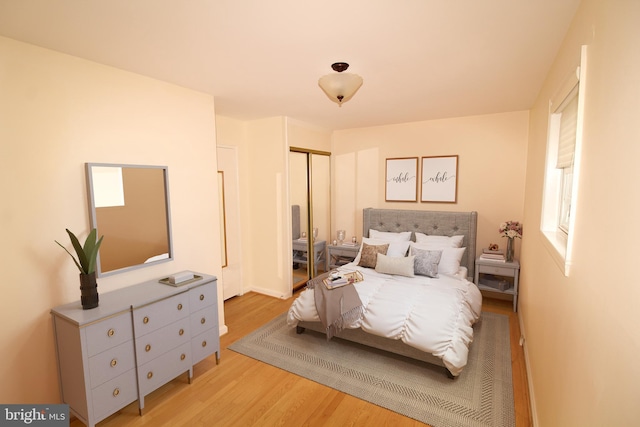 4801 Oxbow Rd, Rockville, MD 20852 - bedroom featuring light wood-type flooring and a closet