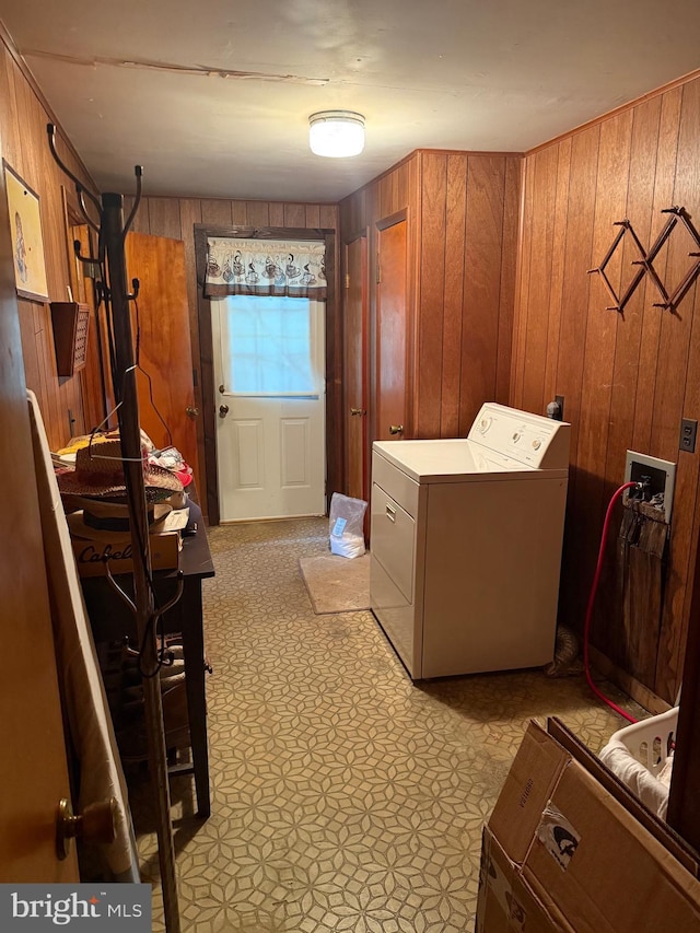81 Hollering Hill Rd, Camden Wyoming, DE 19934 - laundry area with wooden walls and washing machine and clothes dryer