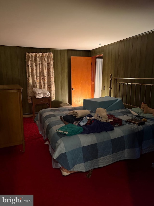 81 Hollering Hill Rd, Camden Wyoming, DE 19934 - bedroom featuring carpet flooring, wood walls, and a baseboard heating unit