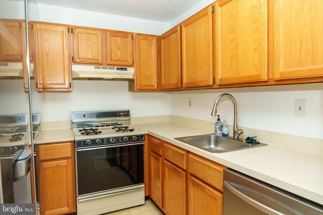 355 Norris Hall Ln Unit 355, Jeffersonville, PA 19403 - kitchen with range with gas stovetop, under cabinet range hood, stainless steel dishwasher, and light countertops