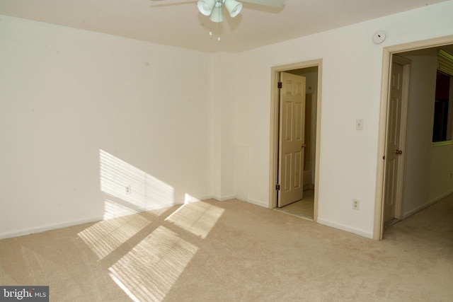 355 Norris Hall Ln Unit 355, Jeffersonville, PA 19403 - empty room with carpet, ceiling fan, a smoke detector, and baseboards