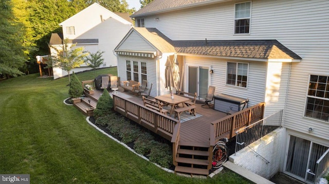 9308 Eagle Ct, Manassas Park, VA 20111 - rear view of house with a wooden deck, a yard, and roof with shingles
