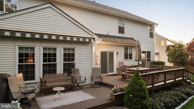 9308 Eagle Ct, Manassas Park, VA 20111 - back of house with a deck and outdoor dining area