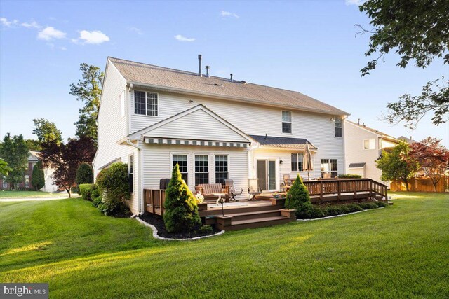 9308 Eagle Ct, Manassas Park, VA 20111 - back of property featuring a wooden deck and a yard