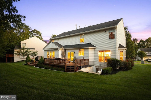 9308 Eagle Ct, Manassas Park, VA 20111 - rear view of house with a wooden deck and a yard