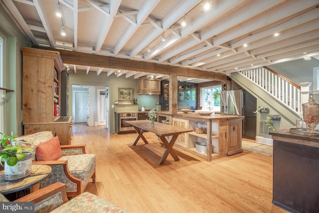 448 Old Dublin Pike, Doylestown, PA 18901 - living room with track lighting, light wood-type flooring, stairway, and beamed ceiling