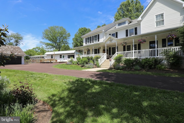 448 Old Dublin Pike, Doylestown, PA 18901 - farmhouse featuring a porch and a front lawn