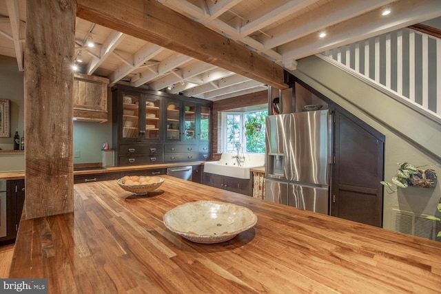 448 Old Dublin Pike, Doylestown, PA 18901 - kitchen featuring butcher block counters, appliances with stainless steel finishes, wood finished floors, beam ceiling, and a sink