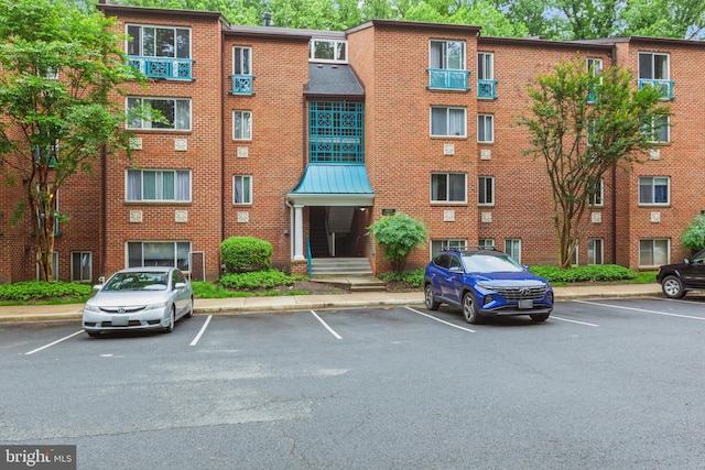 11833 Shire Ct Unit 12C, Reston, VA 20191 - view of apartment building / complex featuring uncovered parking