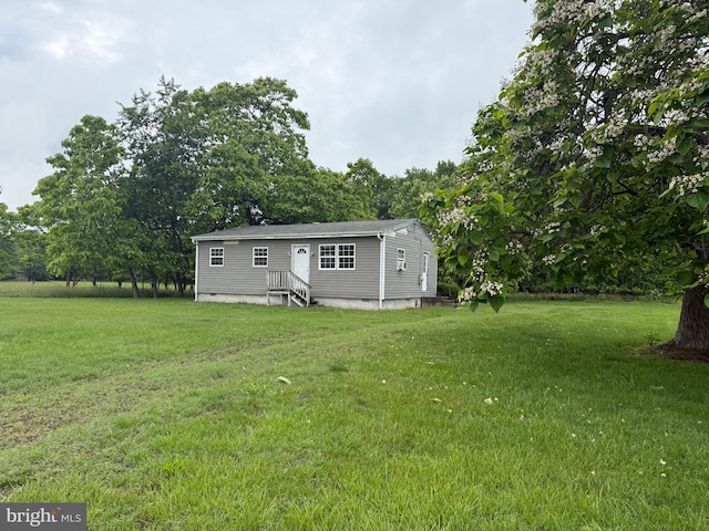 4293 Willow Grove Rd, Camden Wyoming, DE 19934 - back of house with a lawn