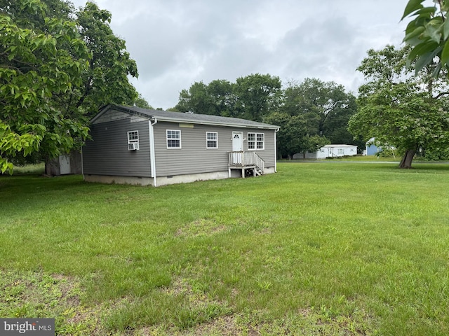 4293 Willow Grove Rd, Camden Wyoming, DE 19934 - back of property with a yard and crawl space