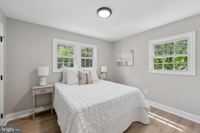 3521 Forestdale Ave, Woodbridge, VA 22193 - bedroom with wood finished floors and baseboards
