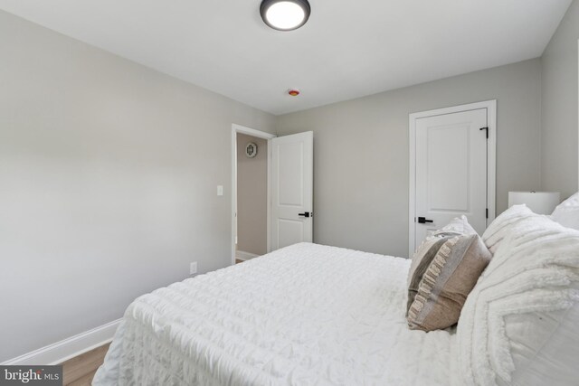 3521 Forestdale Ave, Woodbridge, VA 22193 - bedroom featuring baseboards and wood finished floors